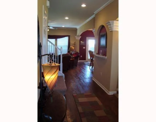 a view of living room with furniture and floor to ceiling window