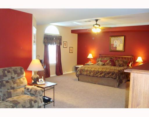 307 Calley Springs Street Portland, TX 78374 - Photo 5 of 10 a living room with furniture a lamp and a chandelier