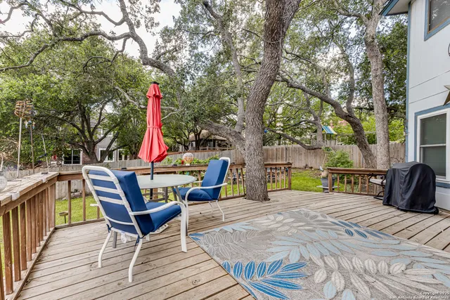 a view of a chairs and tables in the patio