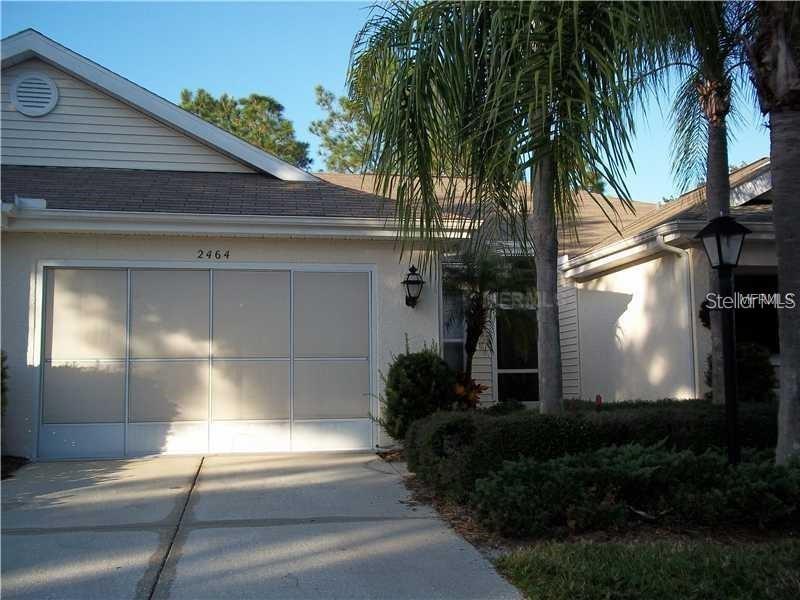 2464 Nantucket Harbor Loop, Unit 96 Sun City Center, FL 33573 - Photo 1 of 19 a view of a house with a yard
