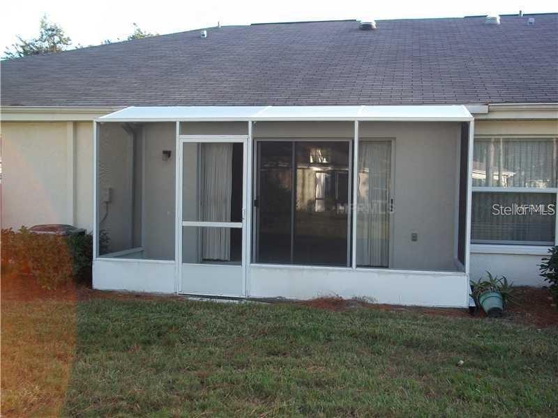 2464 Nantucket Harbor Loop, Unit 96 Sun City Center, FL 33573 - Photo 2 of 19 a view of front door and yard