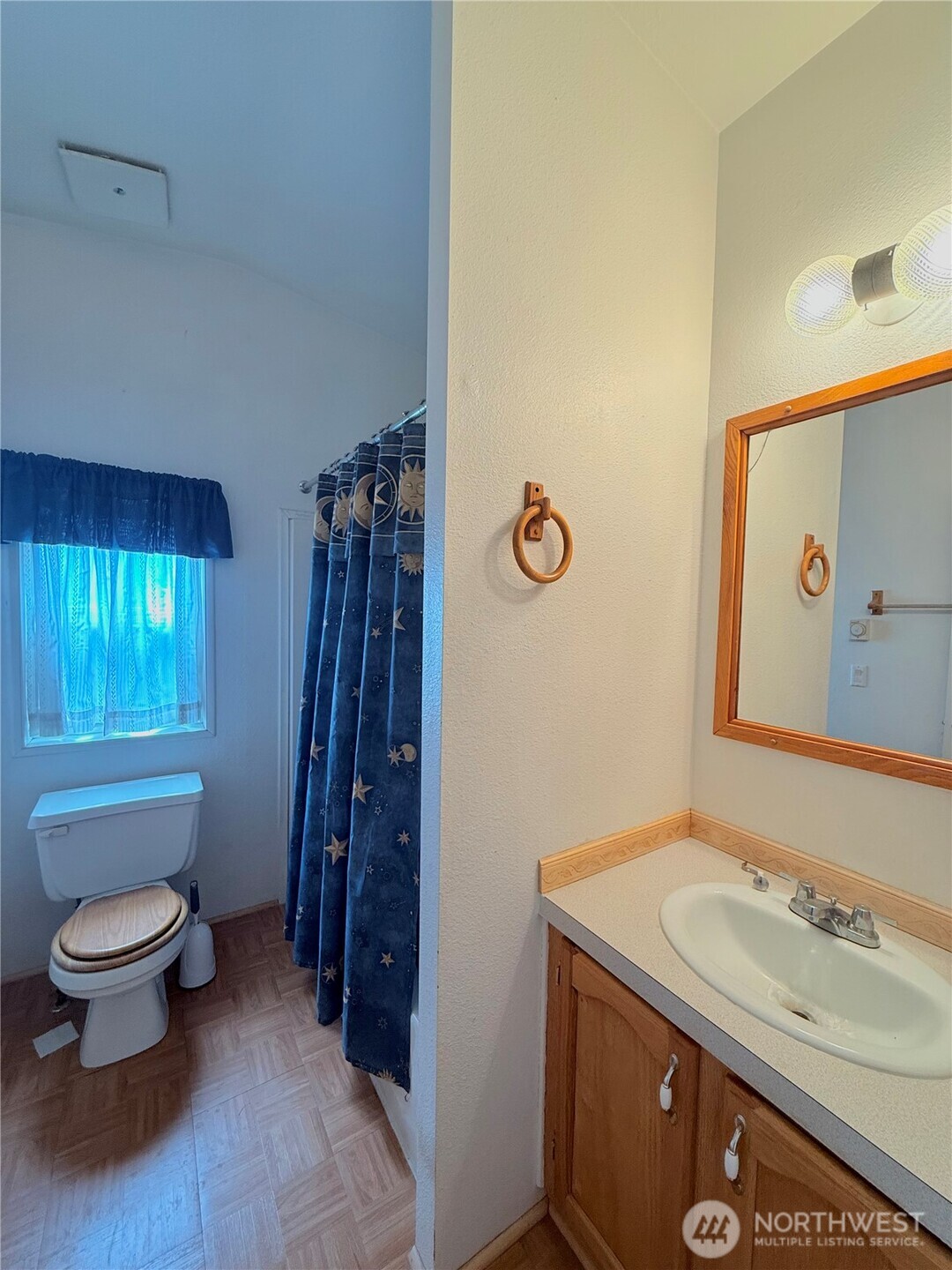 84 Weatherstone Road Omak, WA 98841 - Photo 15 of 17 a bathroom with a sink and a toilet