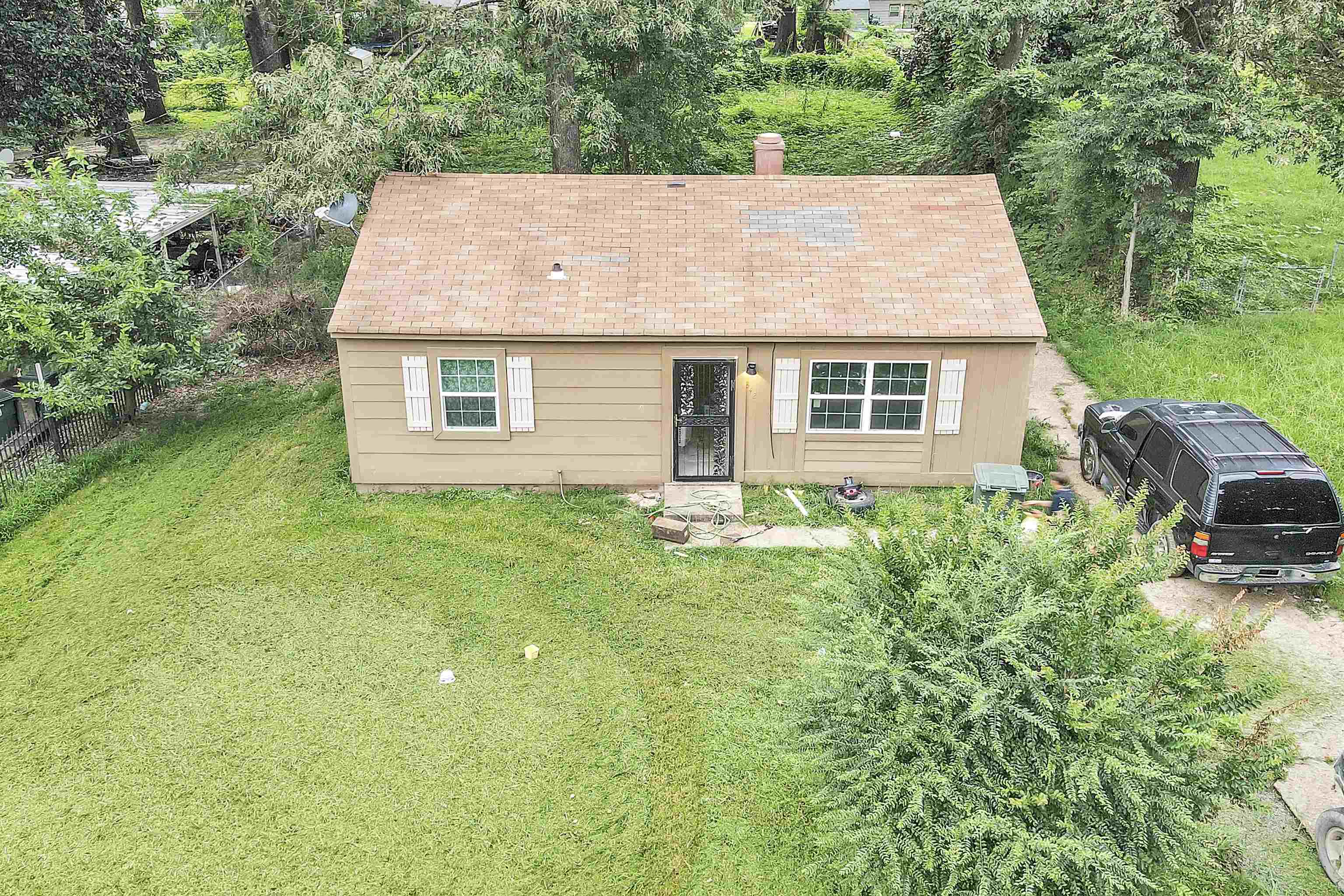 front view of house with a yard