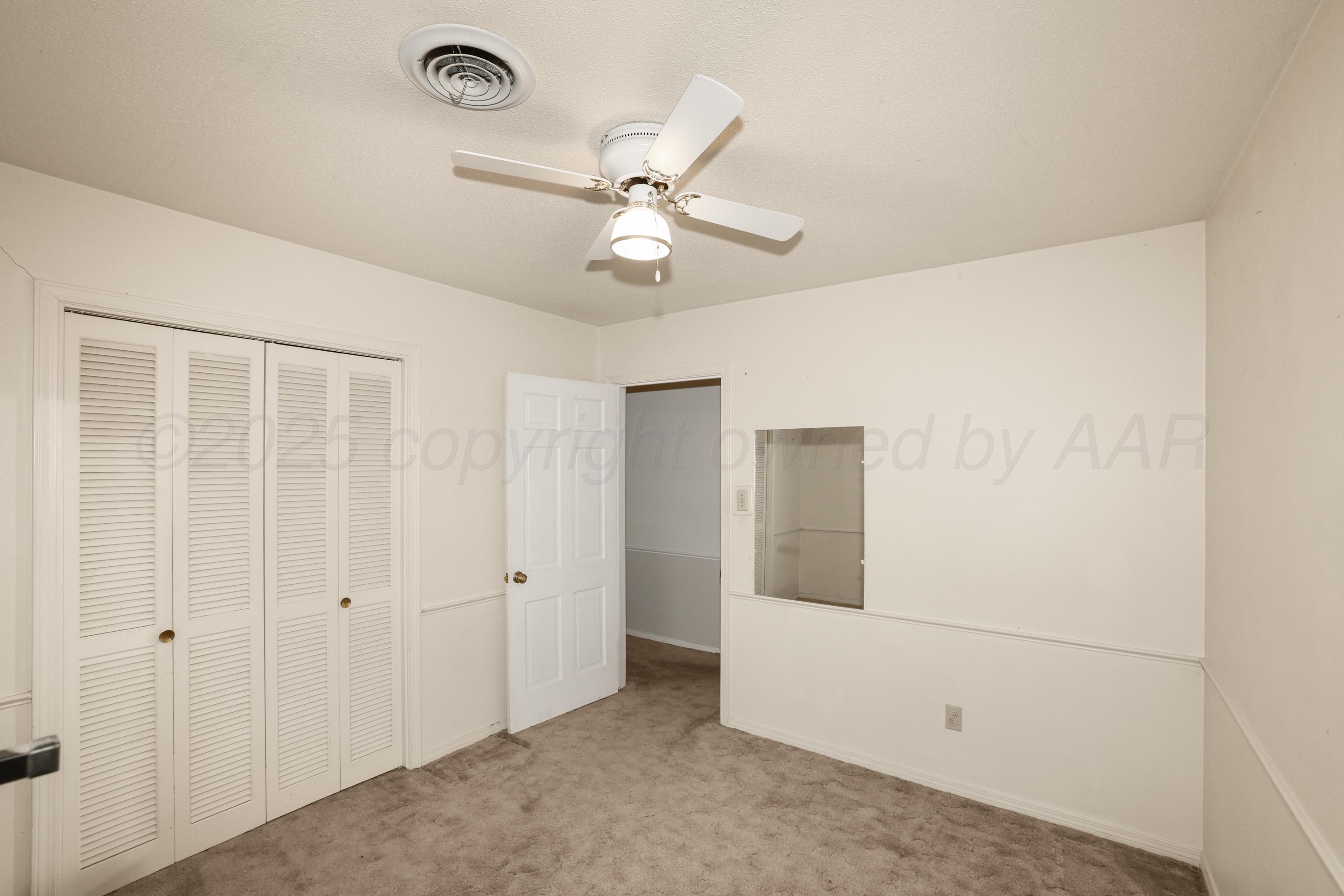 7682 Back Acres Road Amarillo, TX 79119 - Photo 12 of 27 a view of an empty room