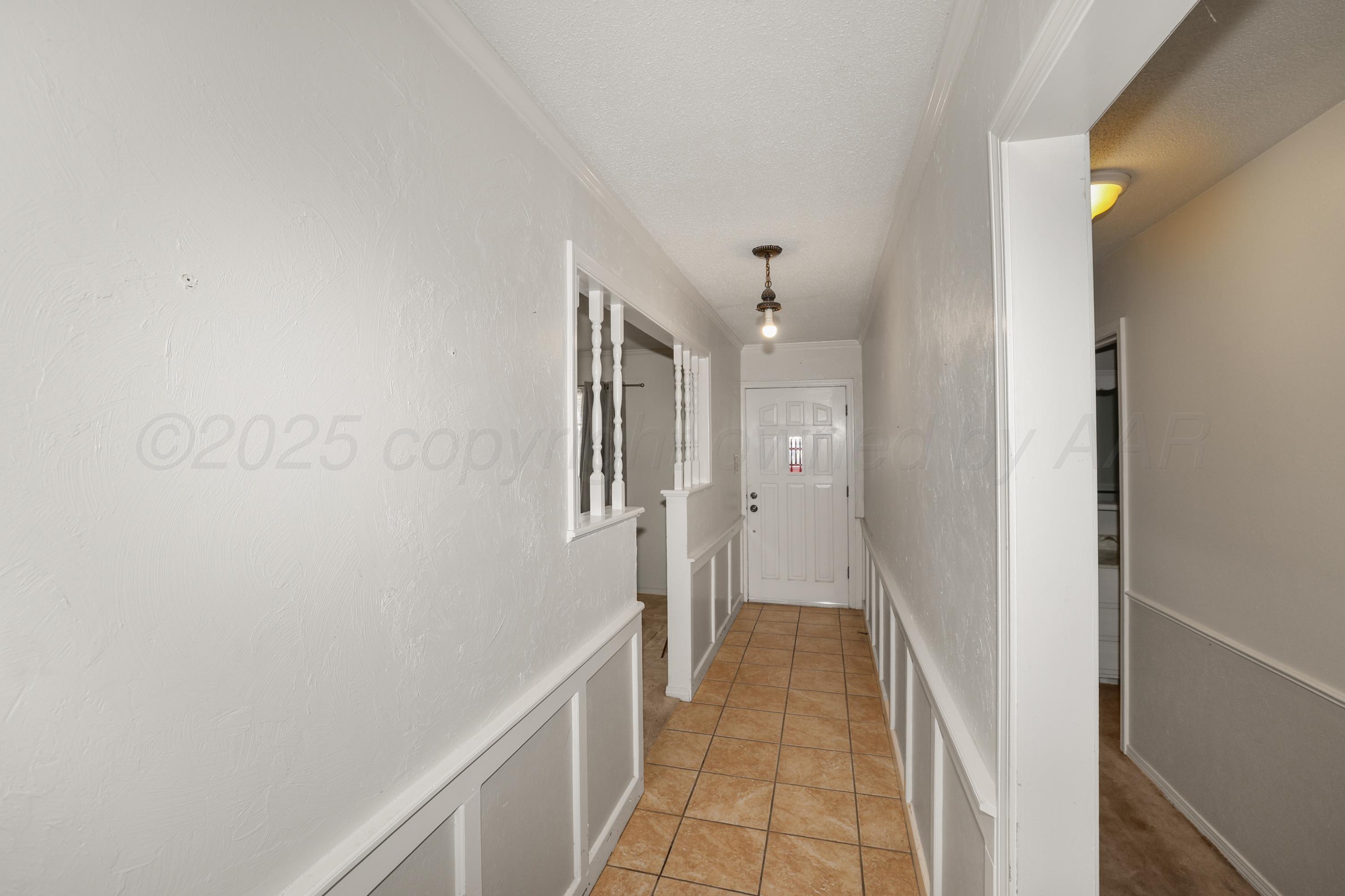 7682 Back Acres Road Amarillo, TX 79119 - Photo 2 of 27 a view of a hallway