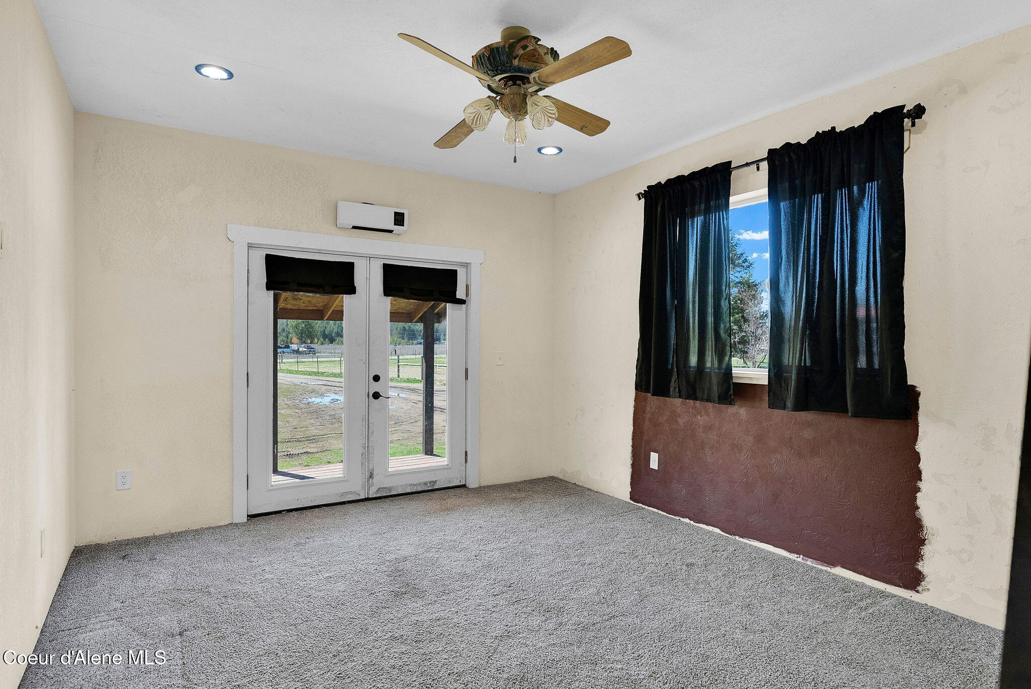 229 McDonald Creek Road Blanchard, ID 83804 - Photo 17 of 42 Second Bedroom with French Doors