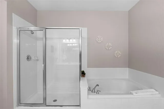 a front view of a residential apartment building with a yard