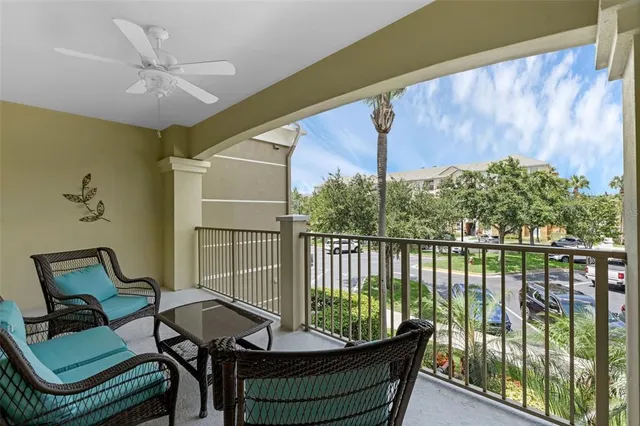 an aerial view of residential houses with outdoor space and river