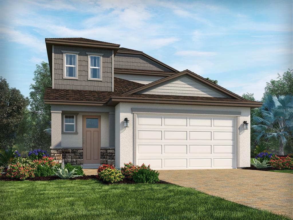 2284 Hen Road Minneola, FL 34715 - Photo 1 of 1 a front view of a house with a garden and plants