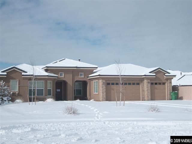 10075 Bull Rider Court Reno, NV 89521 - Photo 1 of 9 a view of a house with a yard and sitting area