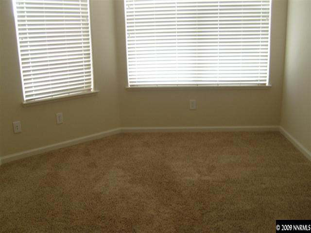 10075 Bull Rider Court Reno, NV 89521 - Photo 6 of 9 an empty room with a window