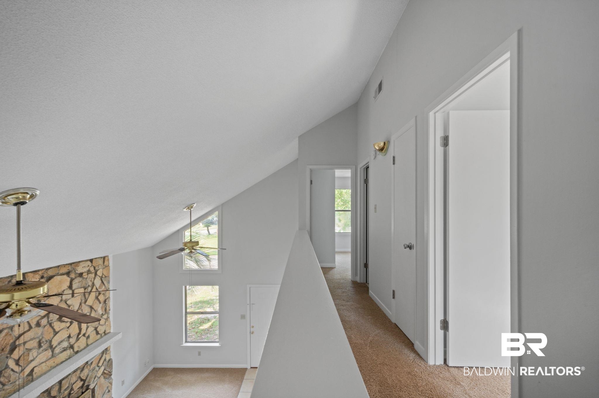 3701 Vista Ridge Drive Mobile, AL 36693 - Photo 29 of 33 Hall with light colored carpet and vaulted ceiling
