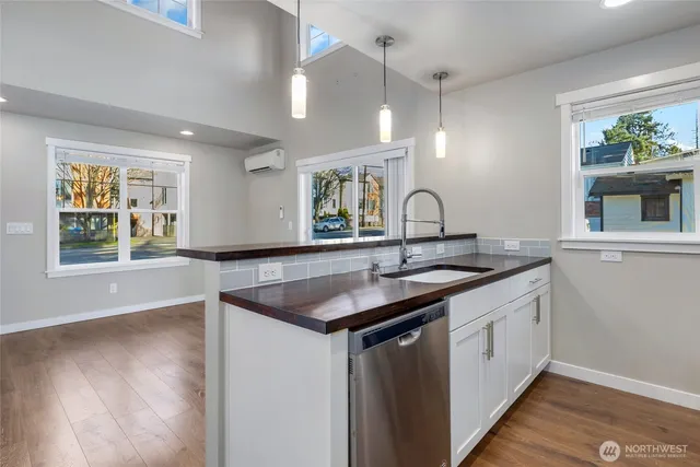 a kitchen with sink and window