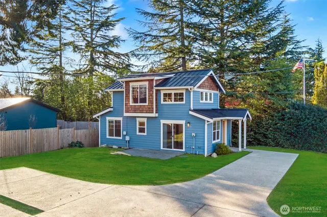 front view of a house with a yard