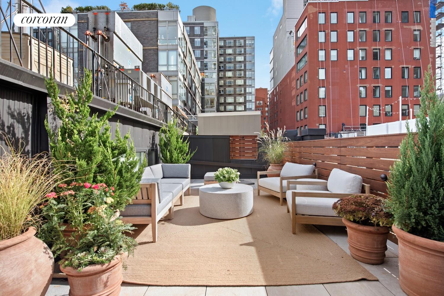 80 Leonard Street, Unit 5H Manhattan, NY 10013 - Photo 14 of 15 a building outdoor space with patio furniture