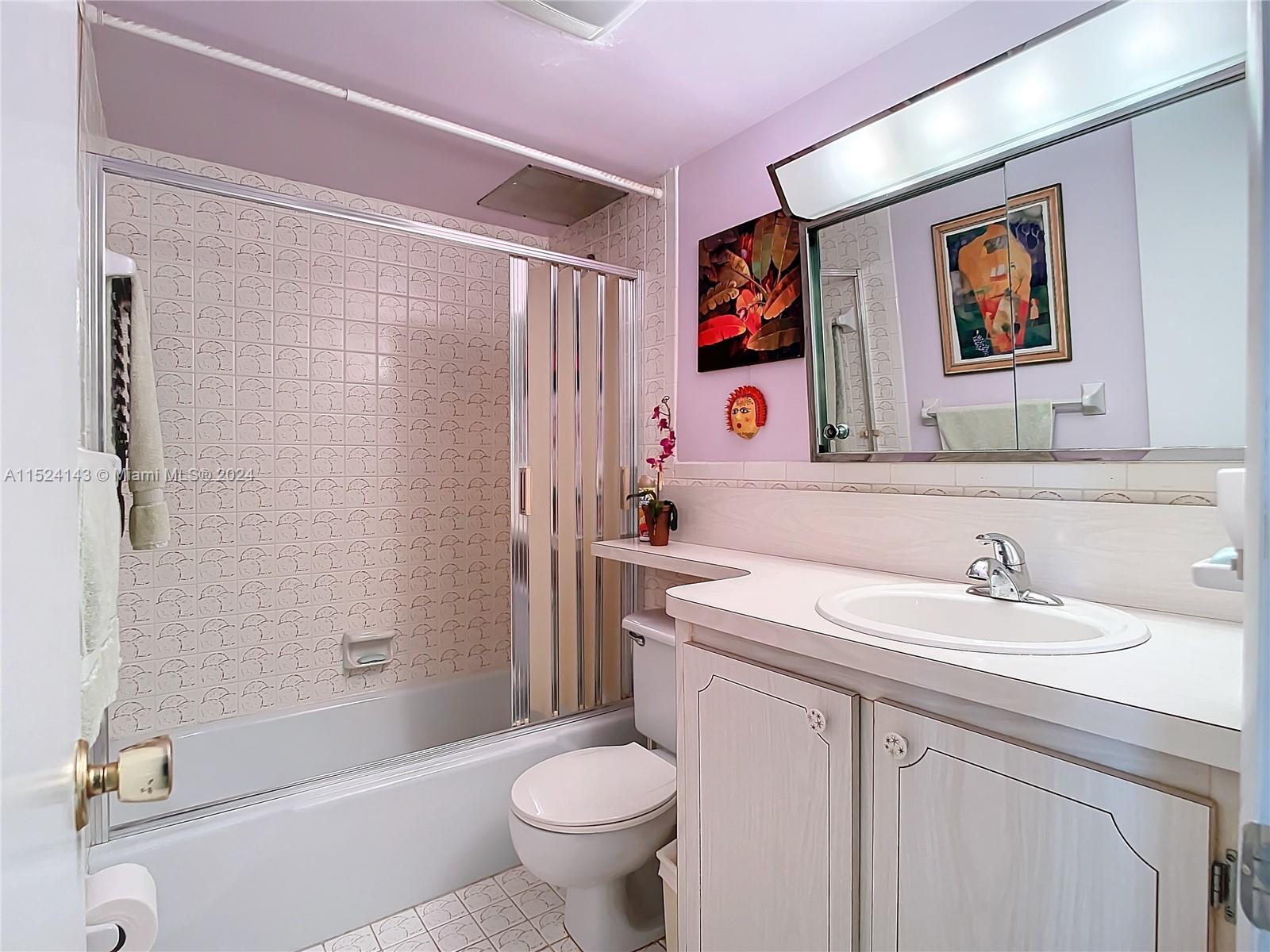 320 South Surf Road, Unit 506 Hollywood, FL 33019 - Photo 23 of 36 a bathroom with a sink toilet and shower