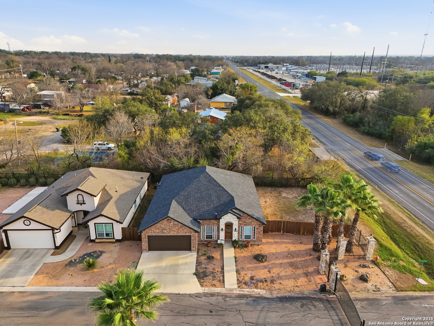 101 Sutton Place Uvalde, TX 78801 - Photo 5 of 36 an aerial view of houses with yard
