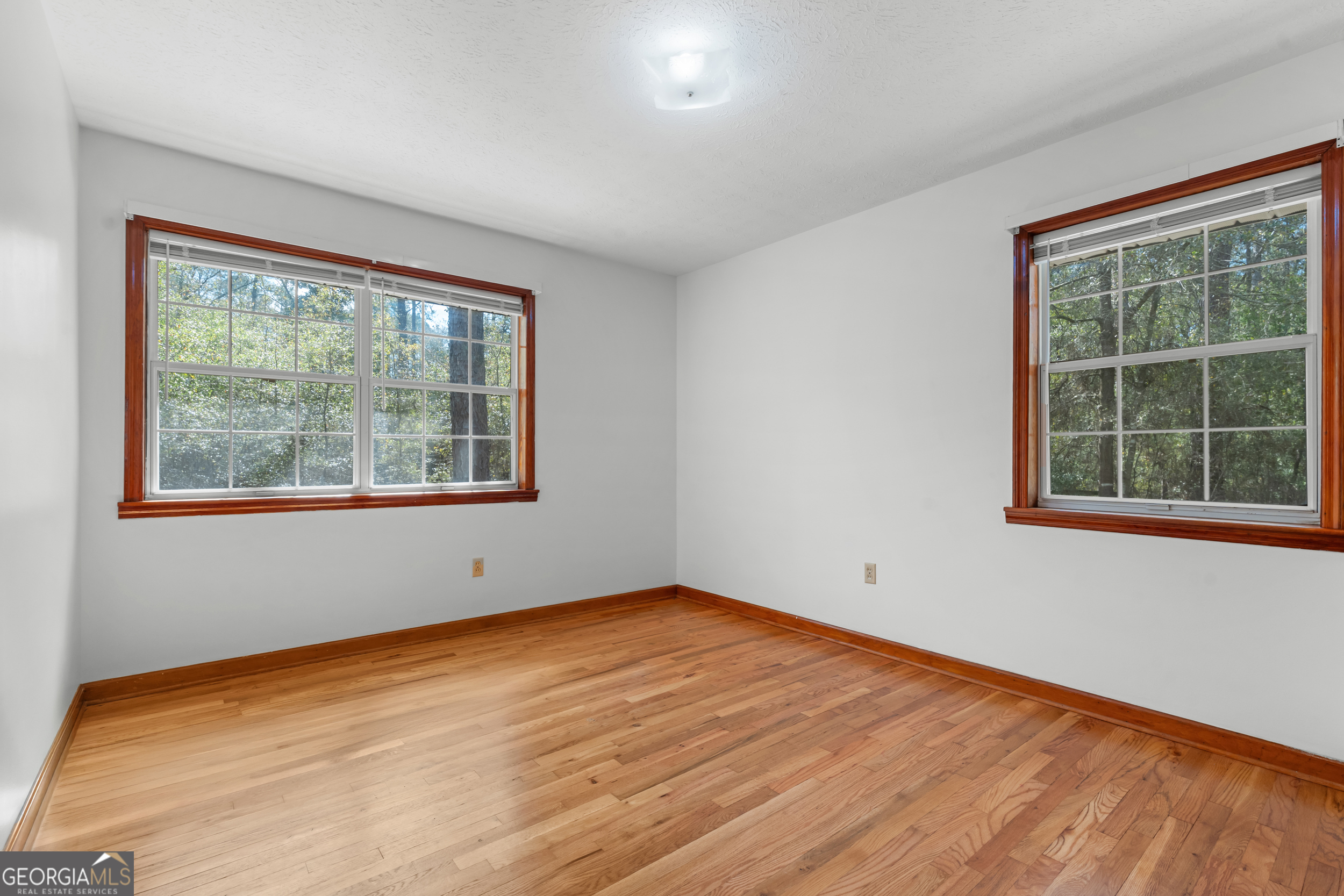 181 Heidt Road Guyton, GA 31312 - Photo 14 of 24 a view of empty room with window