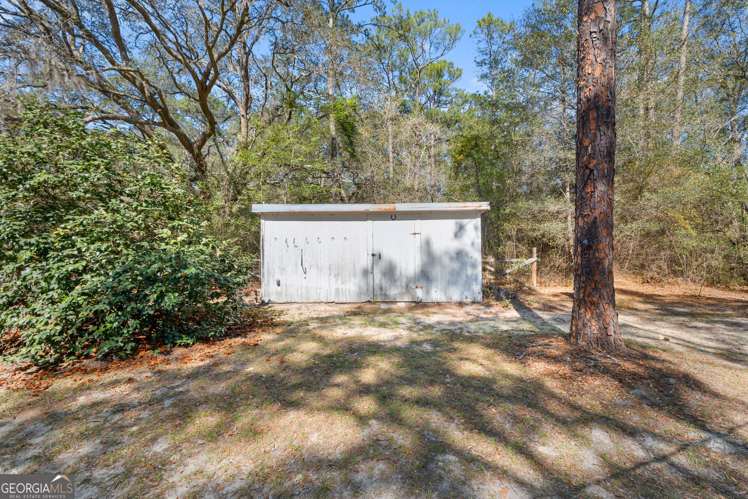 181 Heidt Road Guyton, GA 31312 - Photo 21 of 24 a view of backyard with tree