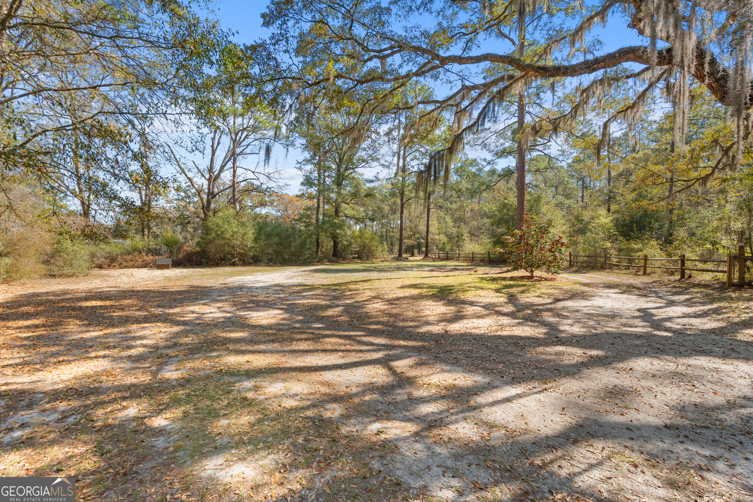 181 Heidt Road Guyton, GA 31312 - Photo 22 of 24 a view of road view with large trees