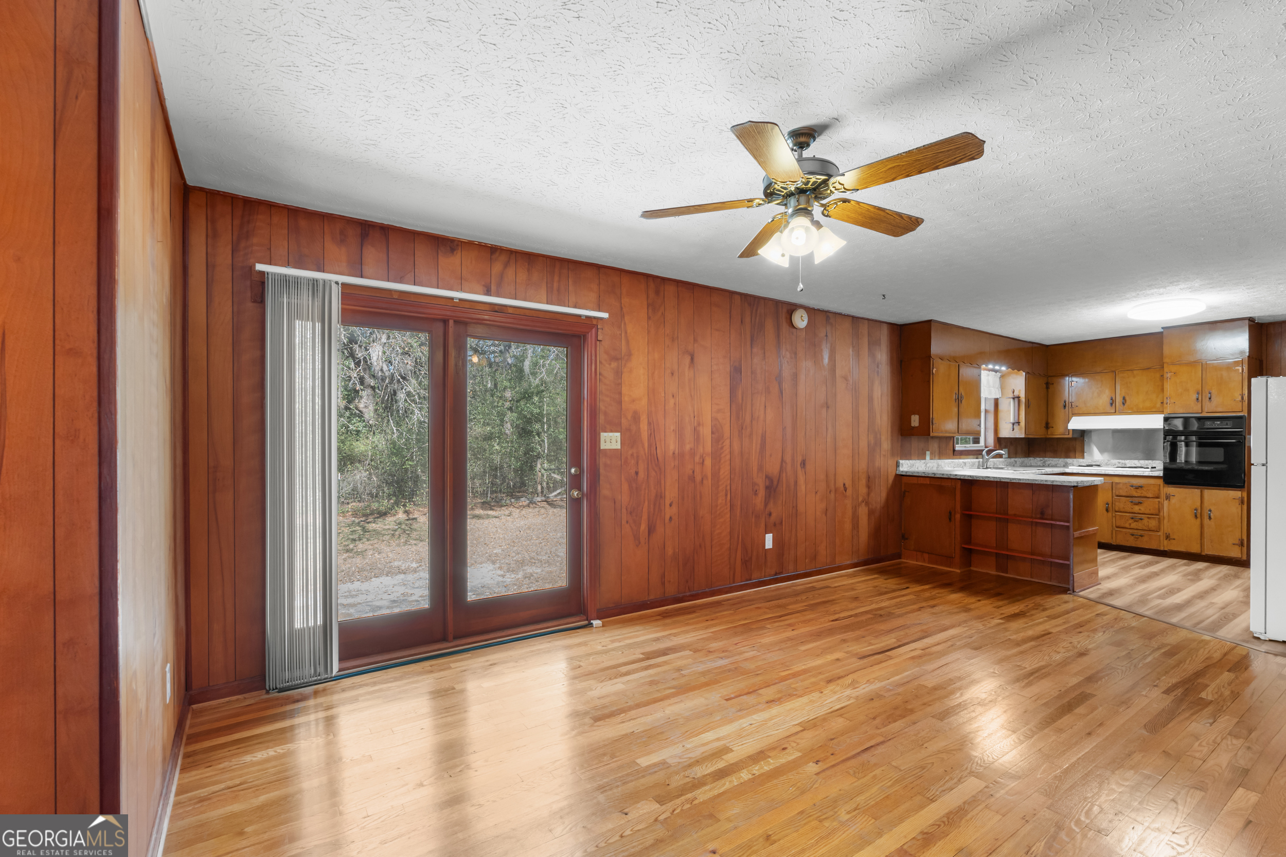 181 Heidt Road Guyton, GA 31312 - Photo 9 of 24 a view of a kitchen with a sink and a window