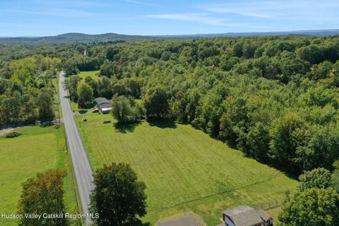 a view of a big yard with green space