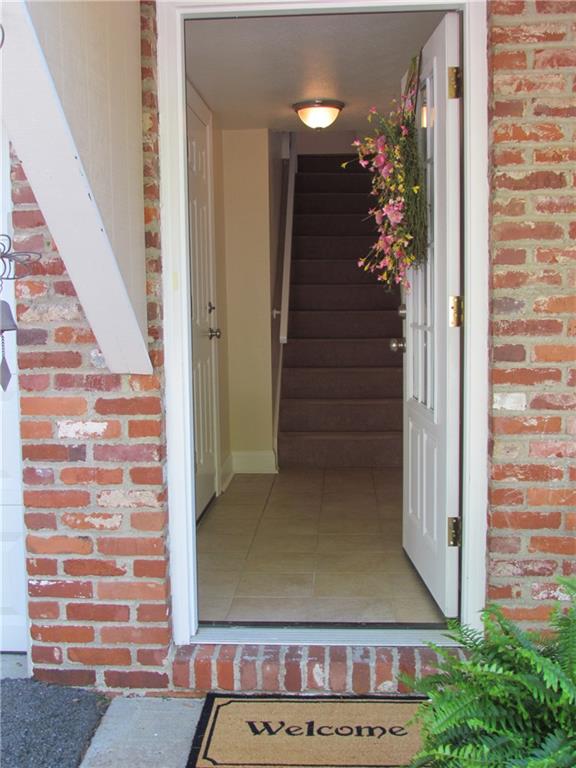 5491 Library Road, Unit 21 Bethel Park, PA 15102 - Photo 4 of 25 WELCOMING ENTRY HALL- COME ON IN!- CERAMIC TILE FLOOR- DIMENTIONAL CARPET ON THE STAIRS UP TO THE LIVING ROOM
