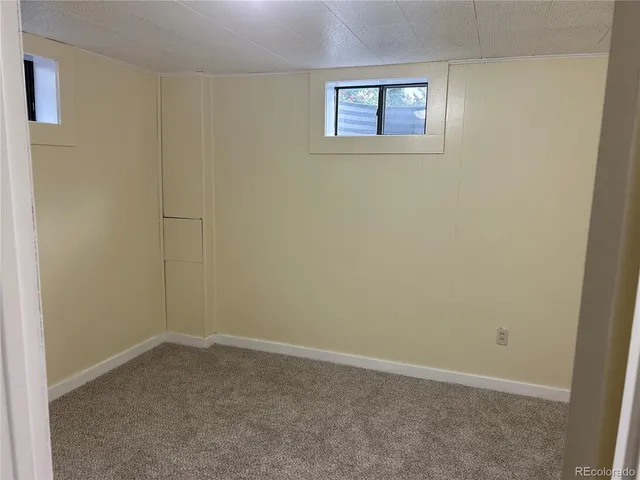 en empty room with a window