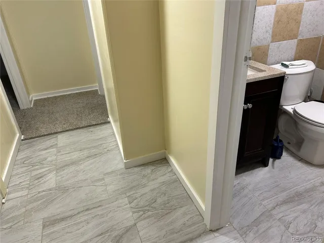 a bathroom with a sink and a toilet