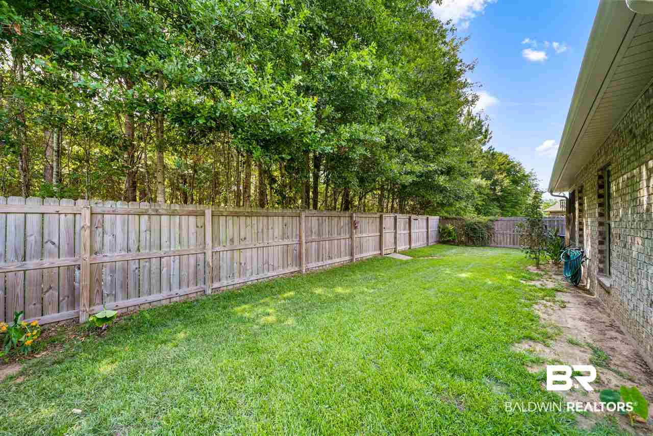 1122 Crown Walk Drive Foley, AL 36535 - Photo 28 of 35 Adjoining Wooded Acres