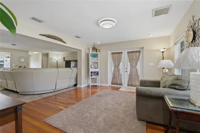a kitchen with a cabinets and chairs