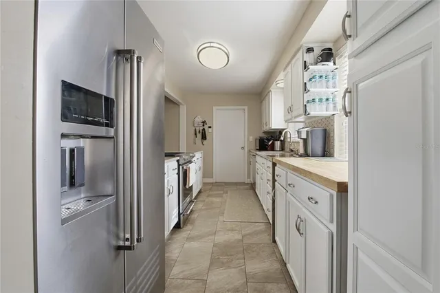 a bathroom with a toilet a sink and a shower