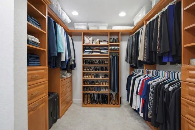 a view of a house with a yard and a porch