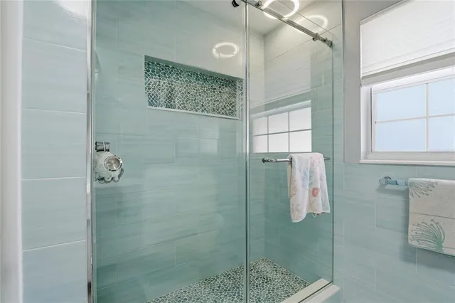 an aerial view of a house with a garden