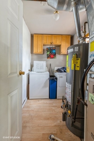 209 Bedford Road Bolingbrook, IL 60440 - Photo 6 of 11 a storage room with washer and dryer