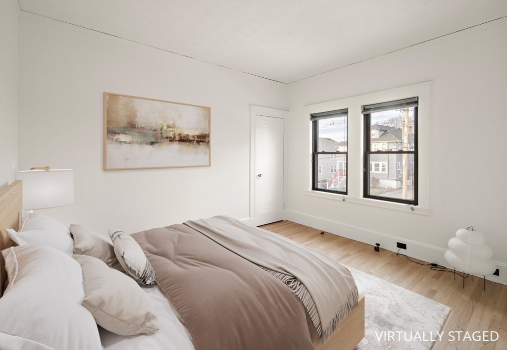 78 Gilbert Road Belmont, MA 02478 - Photo 12 of 20 a bedroom with a bed and a window