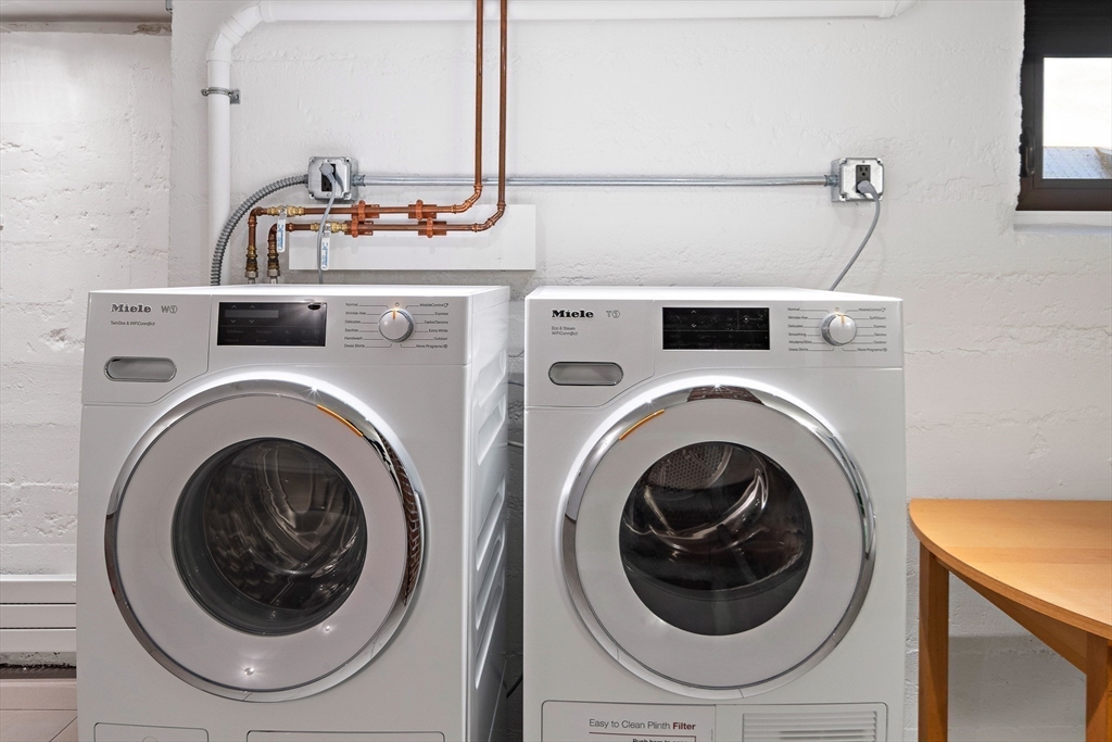 78 Gilbert Road Belmont, MA 02478 - Photo 15 of 20 a utility room with dryer and washer