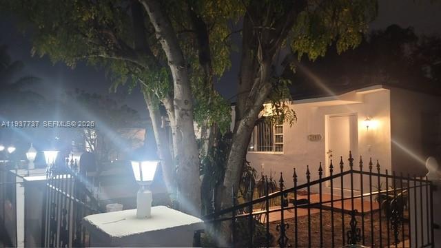 2951 Northwest 49th Street Miami, FL 33142 - Photo 6 of 19 a view of a balcony with a tree
