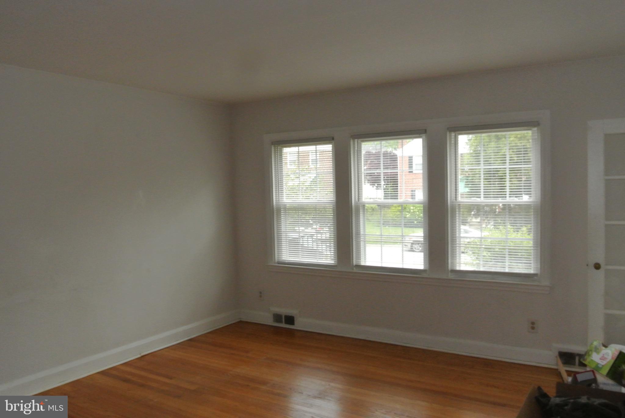 1827 Glen Ridge Road Towson, MD 21286 - Photo 8 of 39 Bright triple windows in living room