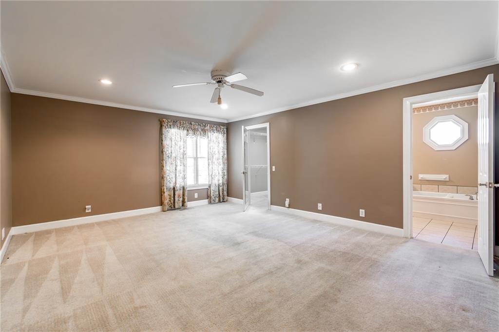 6628 Windvane Point Clermont, GA 30527 - Photo 23 of 41 a view of an empty room with a window