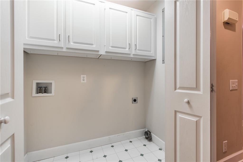 6628 Windvane Point Clermont, GA 30527 - Photo 29 of 41 a bathroom with a window