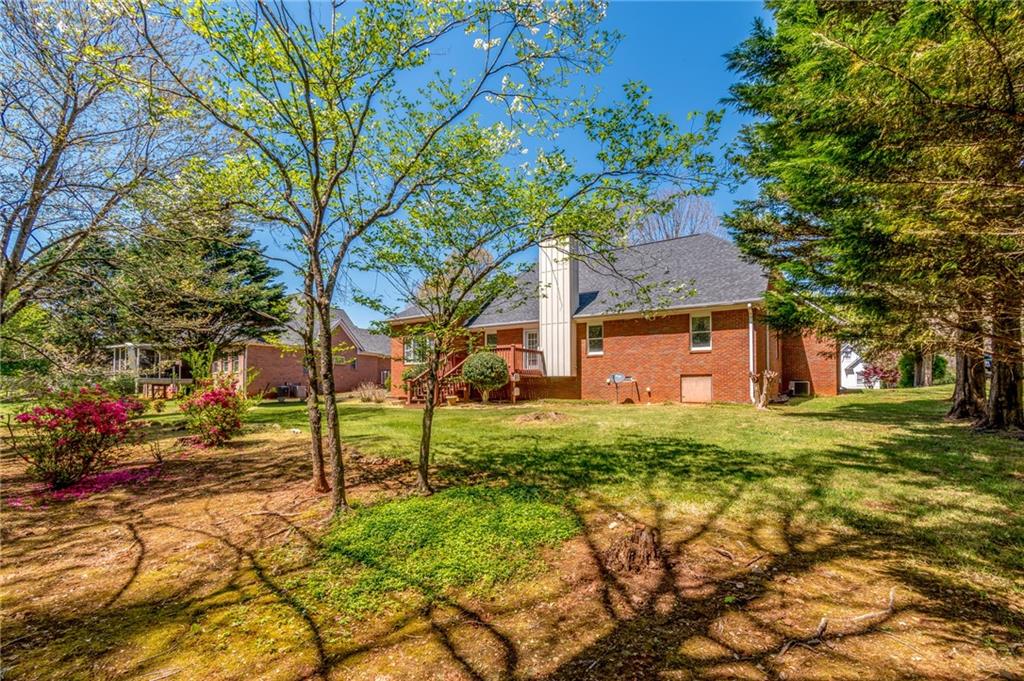 6628 Windvane Point Clermont, GA 30527 - Photo 35 of 41 a house view with a backyard space