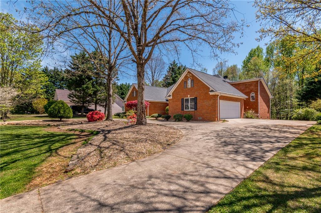 6628 Windvane Point Clermont, GA 30527 - Photo 39 of 41 a view of a house with a yard