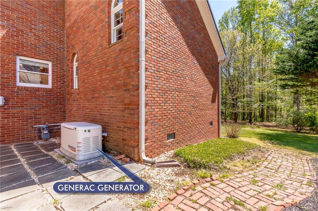 6628 Windvane Point Clermont, GA 30527 - Photo 5 of 41 a view of a back yard of the house