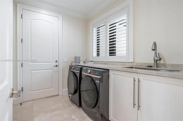 a kitchen with stainless steel appliances granite countertop a stove and a refrigerator
