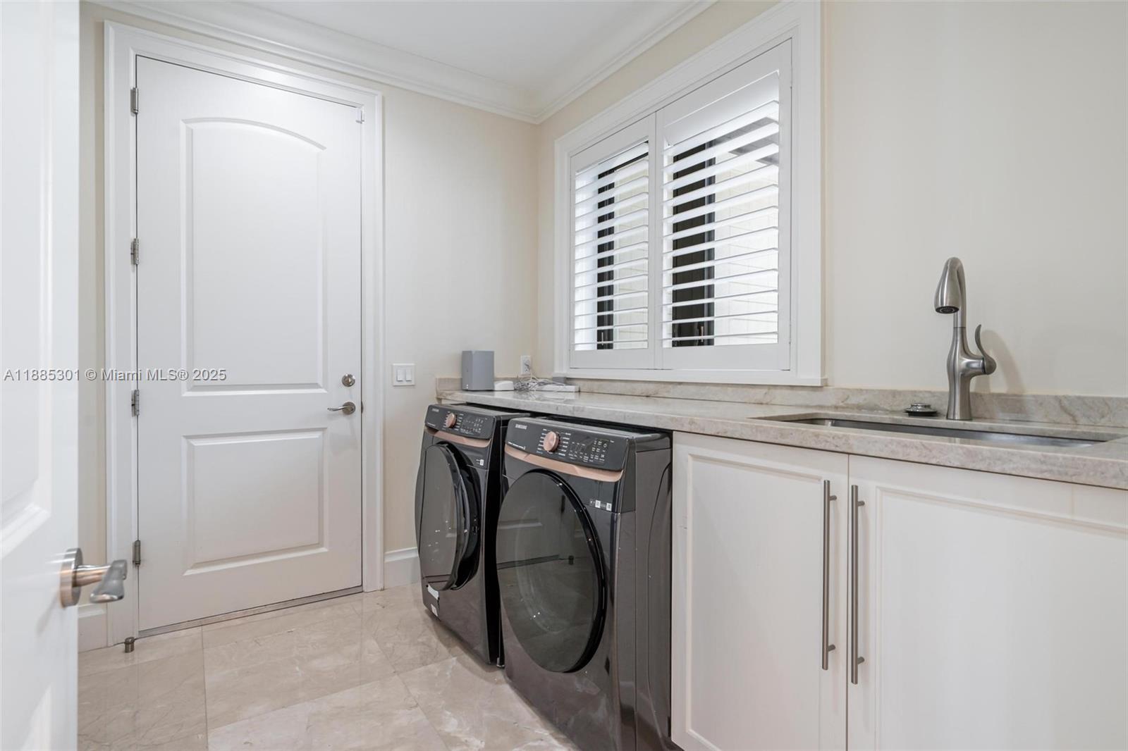 2381 Northeast 24th Street Lighthouse Point, FL 33064 - Photo 21 of 29 a bathroom with a granite countertop sink and a window