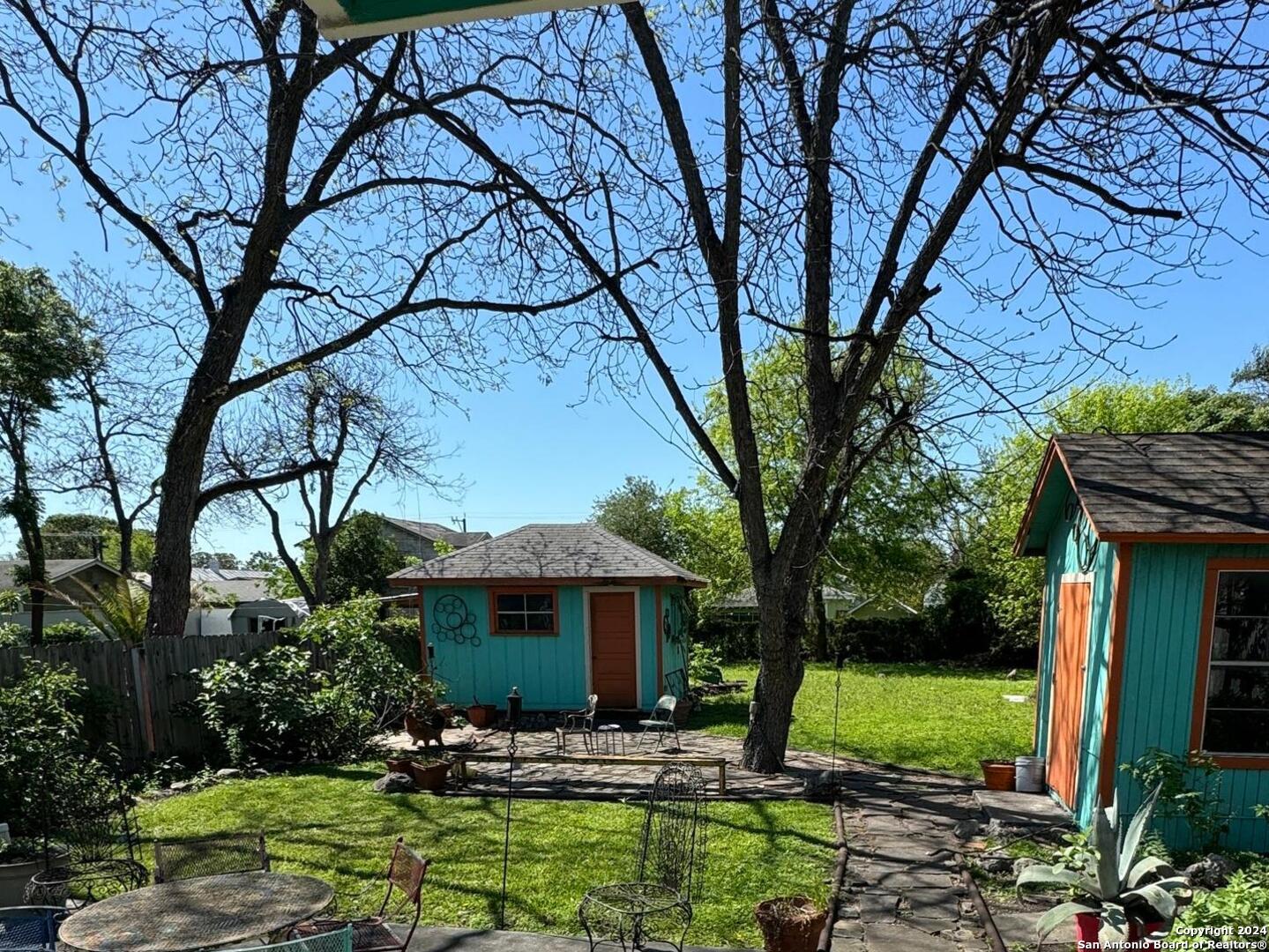 114 Helena Street, Unit 2 San Antonio, TX 78204 - Photo 12 of 14 a front view of a house with garden