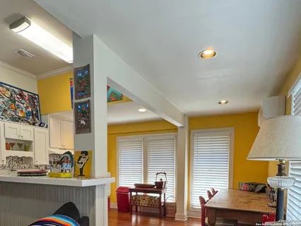 a view of kitchen with furniture and window