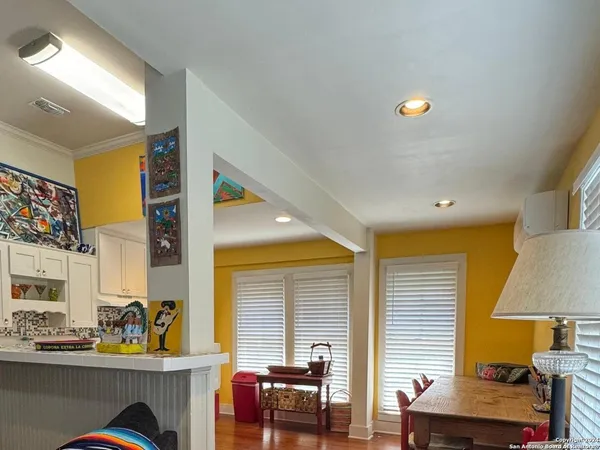 a view of kitchen with furniture and window