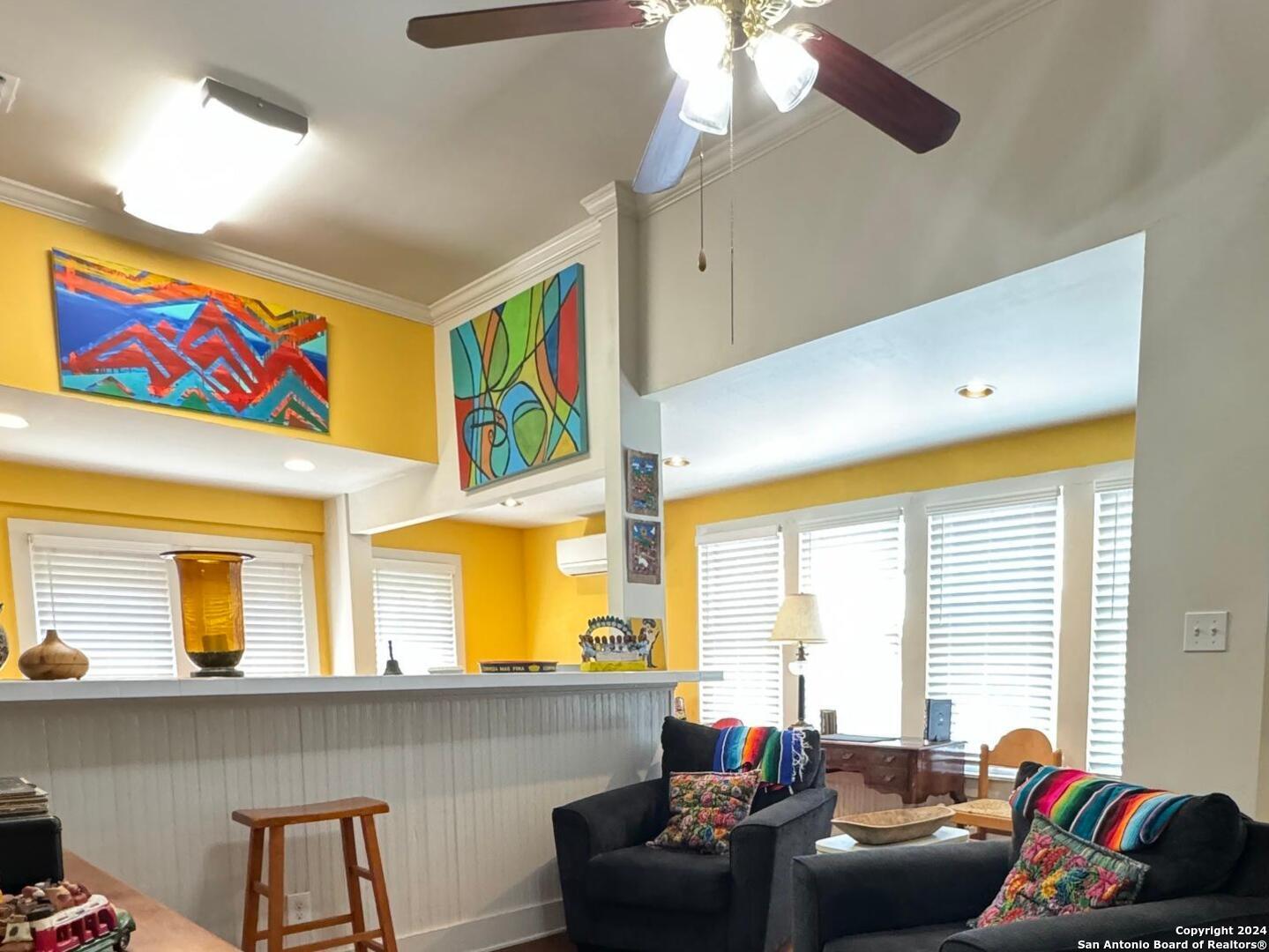 114 Helena Street, Unit 2 San Antonio, TX 78204 - Photo 8 of 14 a living room with furniture and a large window